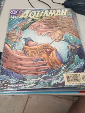 DC Aquaman Comic Cover in Aqua, Gold and Blue In A Sleeve